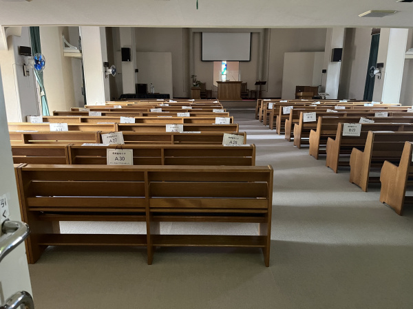 We went to go see the church and elementary (kindergarten?) school and see if there was anyone there. No one was at the church. But the door was open...so I went in and grabbed a picture at the door to the sanctuary.